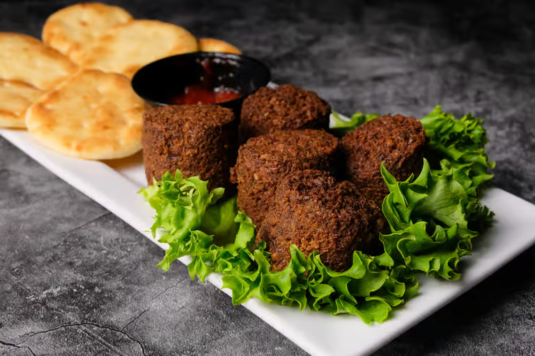 Crispy fried food platter served at Moustache Hookah Lounge